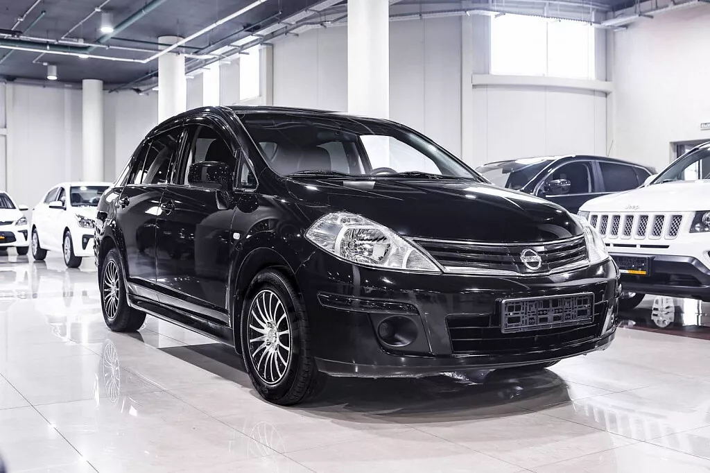 Купить Tiida с пробегом